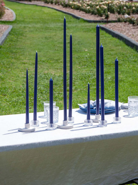 Sapphire Moreton Taper Candle, 25cm, eco-friendly and handmade, displayed outdoors.