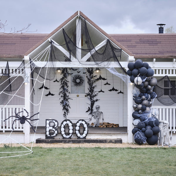 Happy Halloween Balloon Bunting with Hanging Bats and Cobwebs - The Pretty Prop Shop Parties
